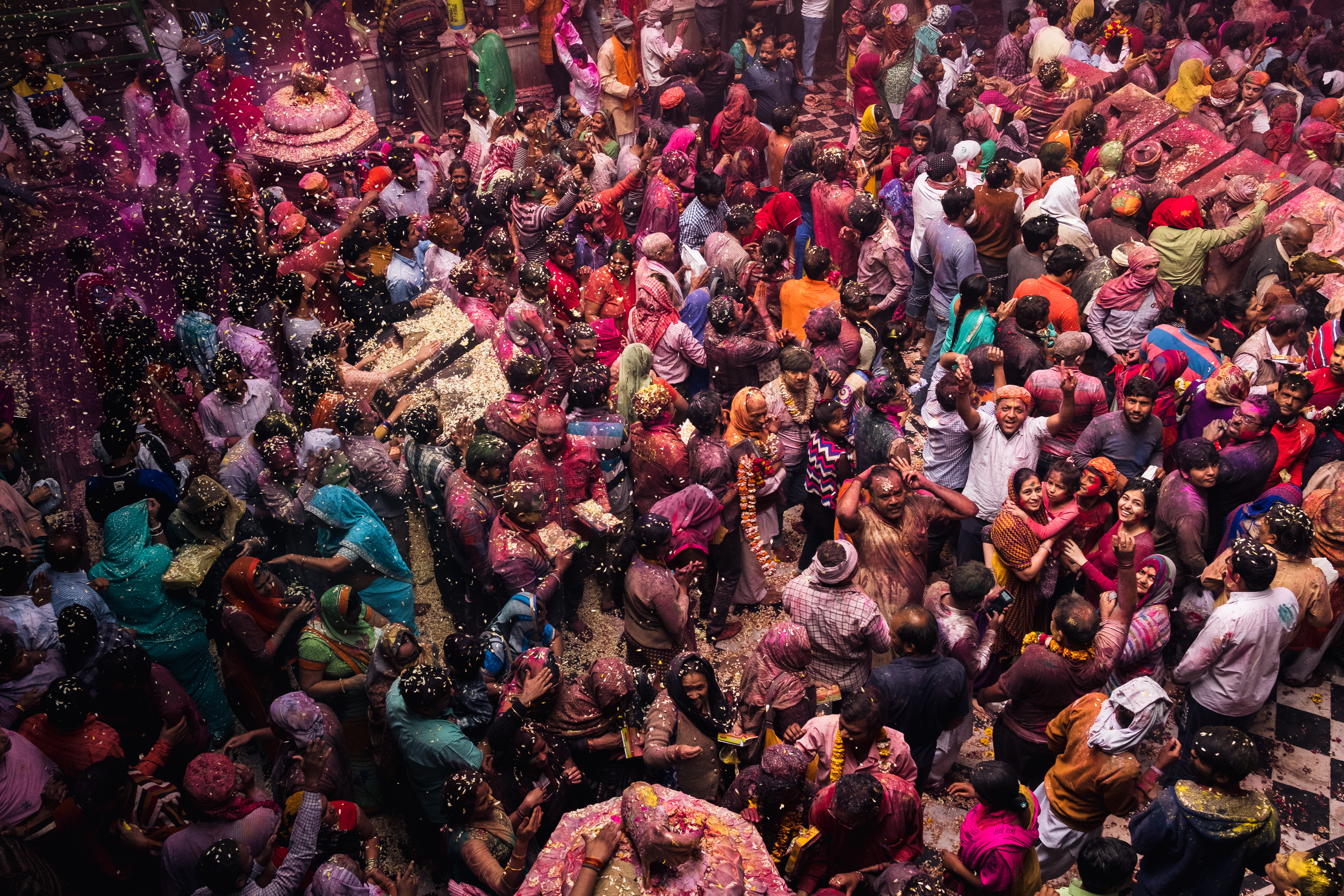 India Street Photography During Holi Festival. Looking down on the crow in Mathura. Images by Vinson Images