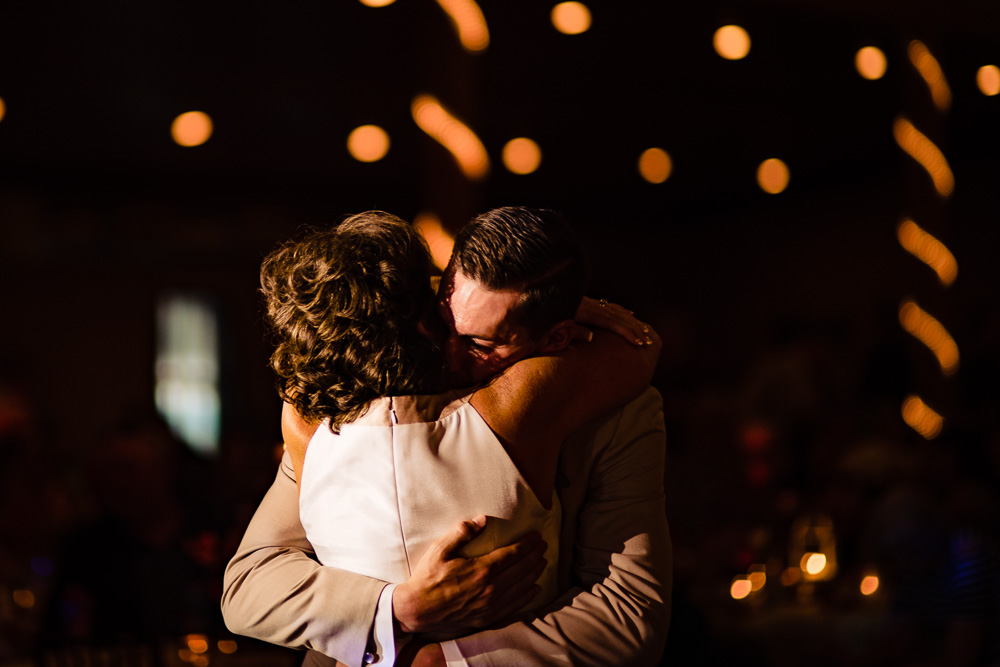Pittsburg-kansas-wedding-photography-vinson-images-first-dance-mother-son-hug