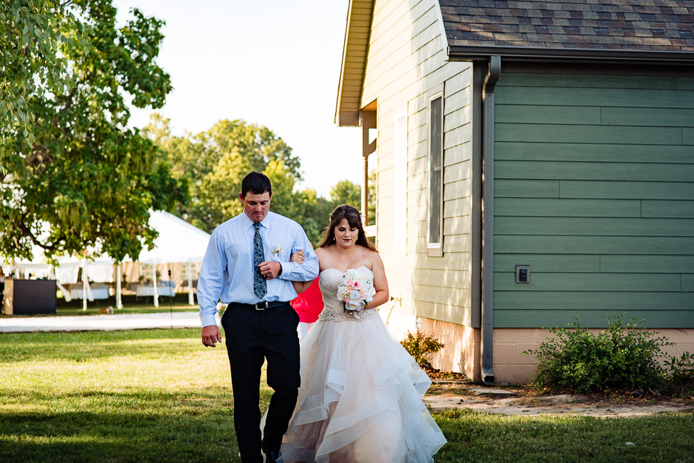 Garfield-Arkansas-wedding photography-backyard-wedding-northwest-arkansas-vinson-images-brother-walking-bride
