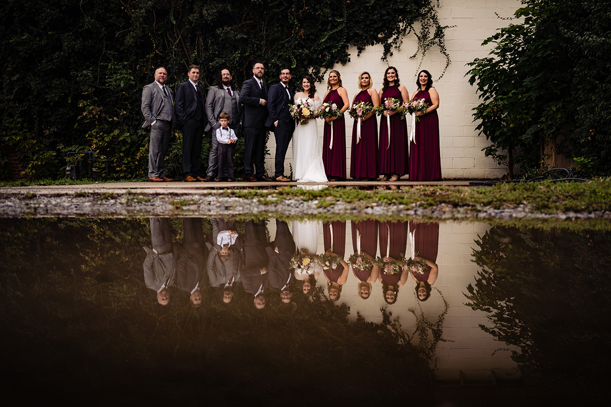 Centerton-Arkansas-Wedding-The-Ravington-NWA-Wedding-bridal-party-portrait-with-water-reflection