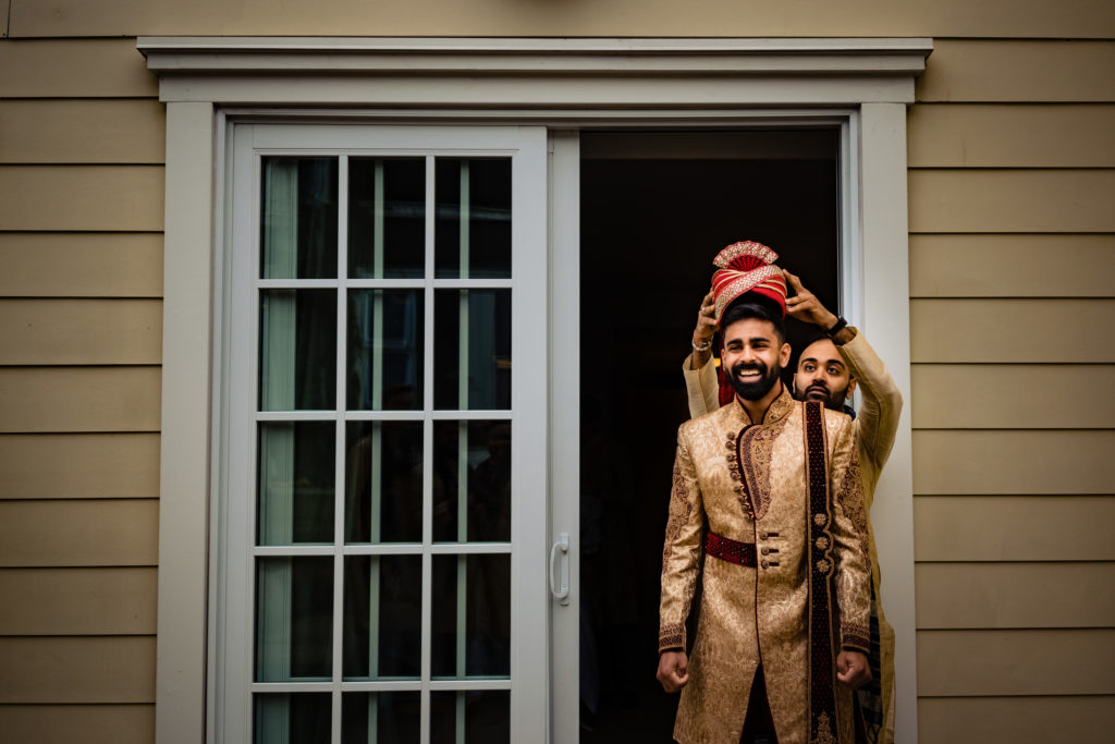 Northwest Arkansas Indian Wedding Photography Vinson Images- groom get shelp with his turban 