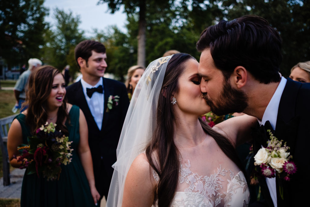 Fayetteville Arkansas Wedding - Old Main Lawn ceremony - bride and groom kiss after ceremony