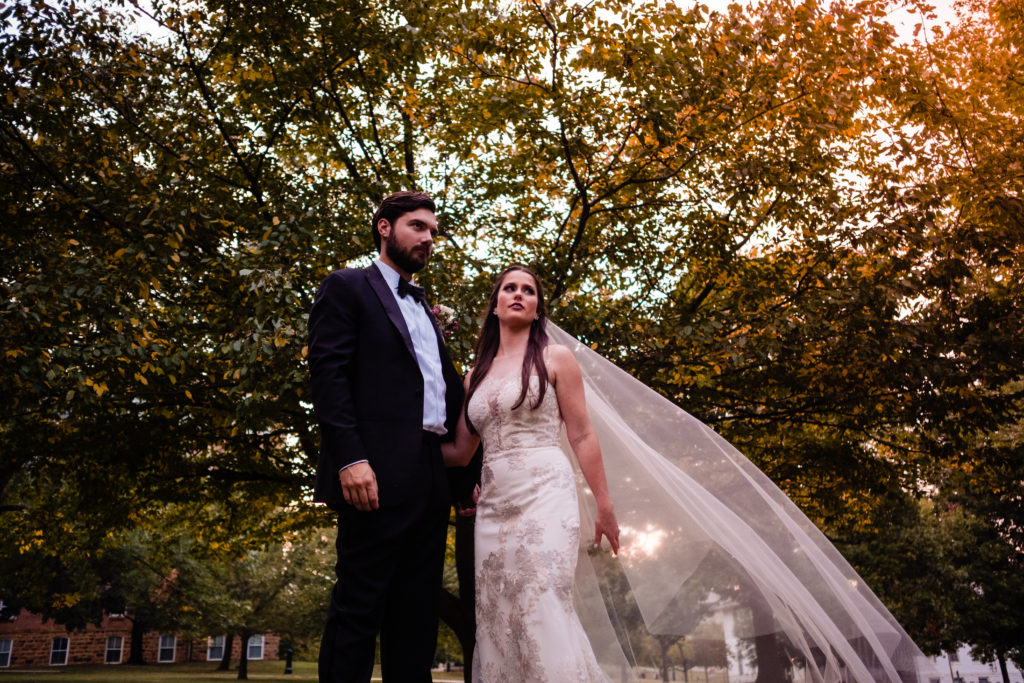 Fayetteville Arkansas Wedding - Old Main Lawn ceremony - dramatic pose