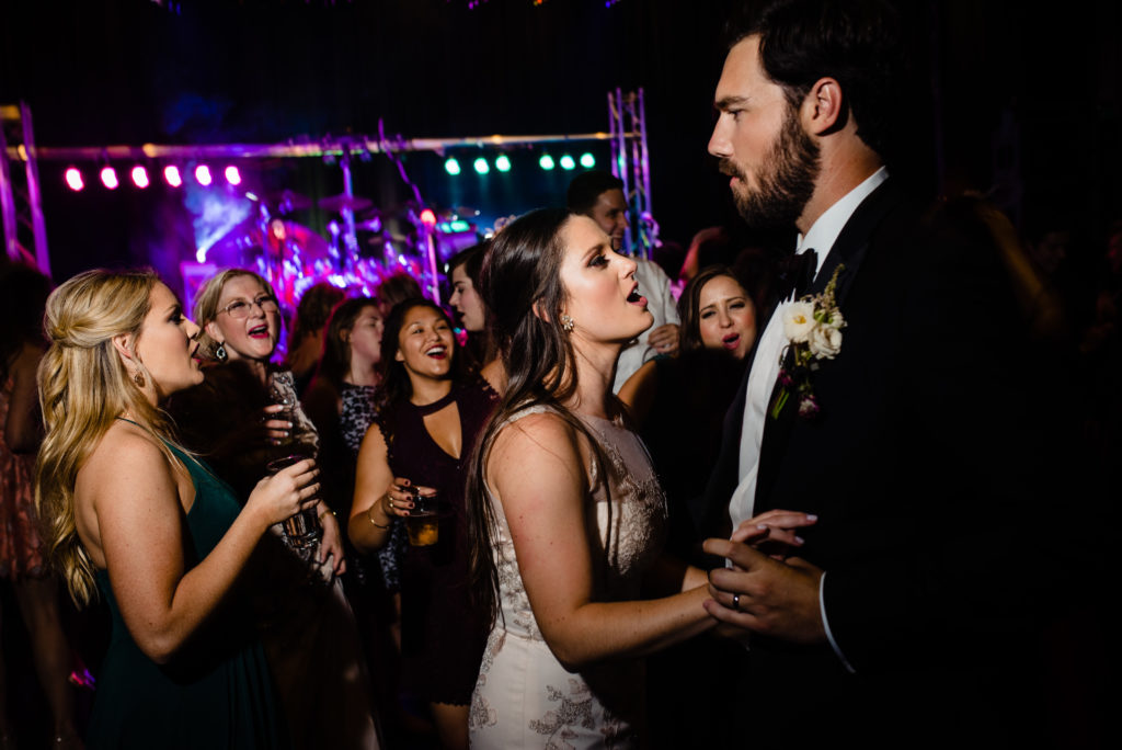 Vinson Images - Walton Arts Center Wedding - bride and groom sing to each other
