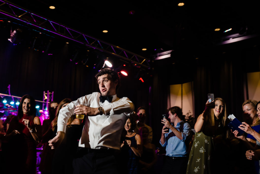 Vinson Images - Walton Arts Center Wedding - groomsmen with crazy dance skills