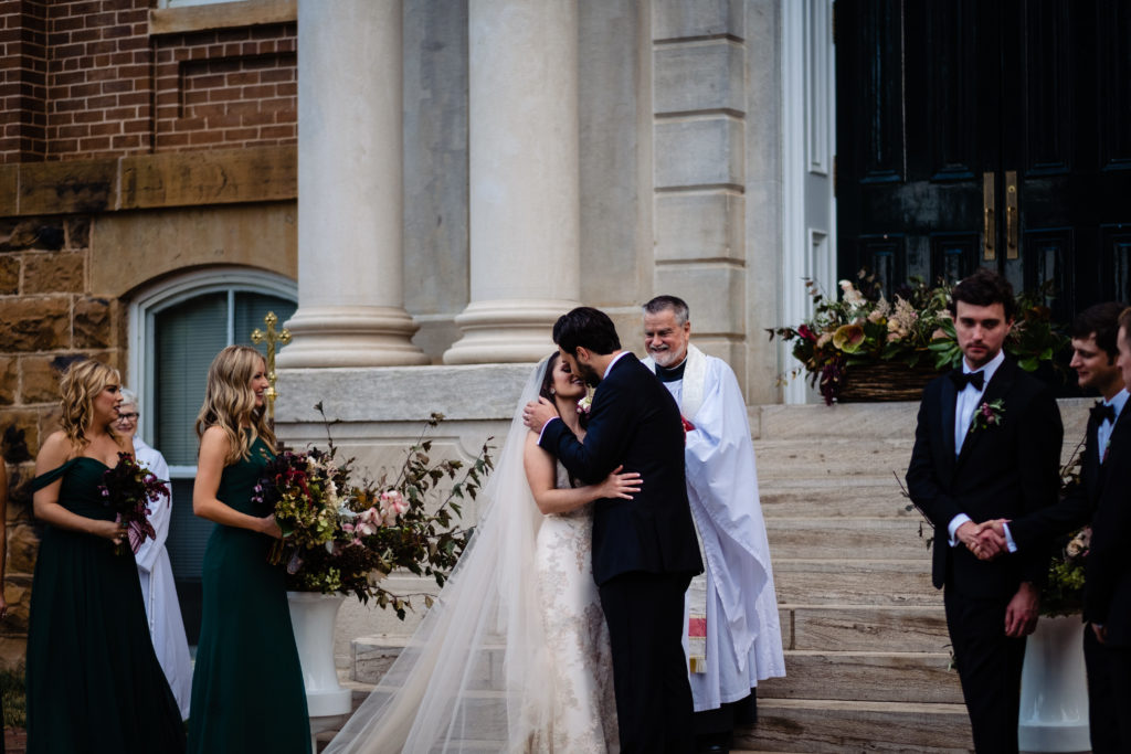 Fayetteville Arkansas Wedding - Old Main Lawn ceremony - first kiss