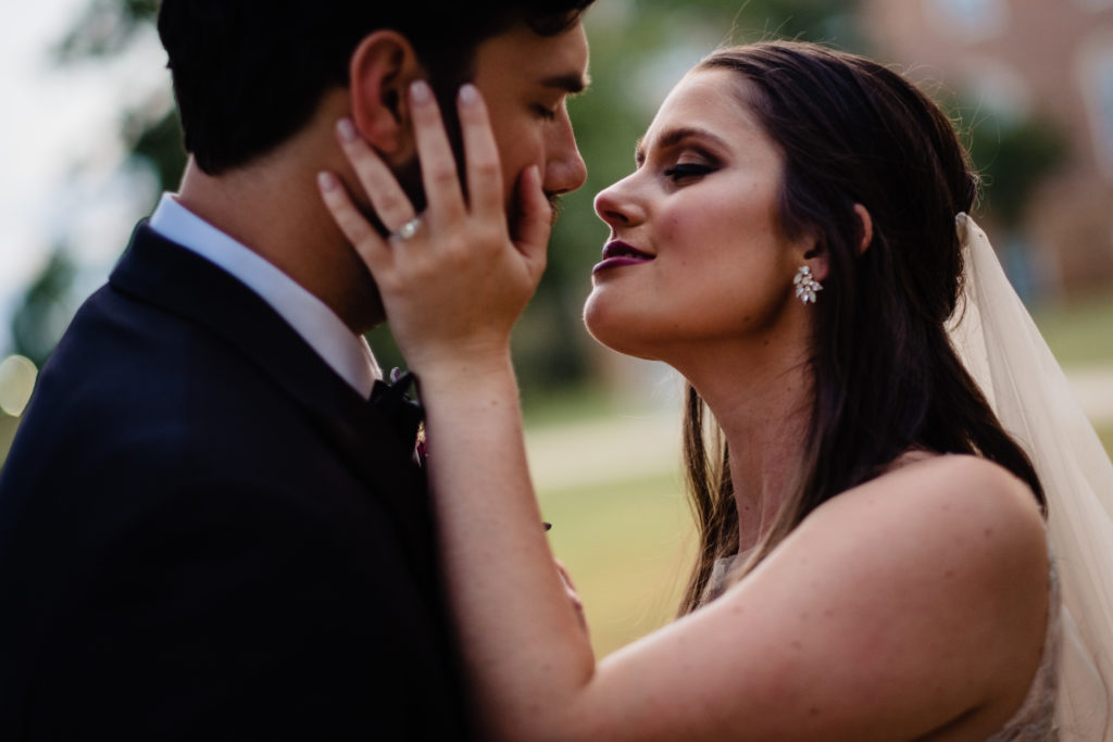 Fayetteville Arkansas Wedding - Old Main Lawn ceremony - bride and groom kiss