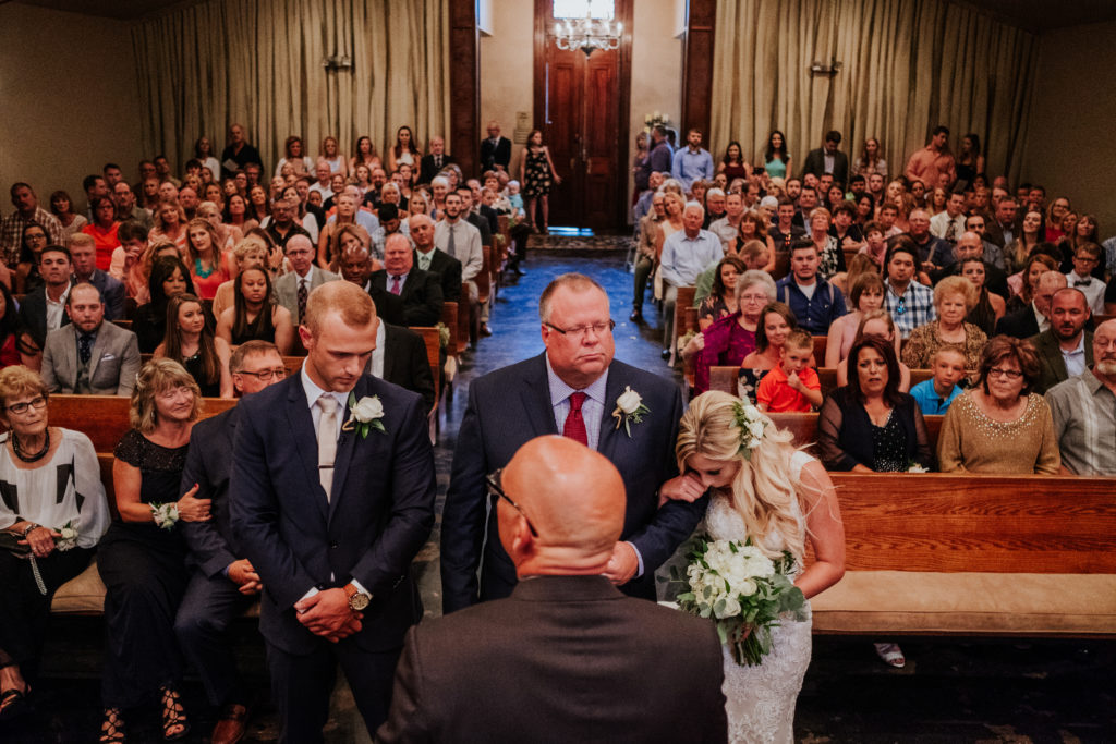 The Stone Chapel At Matt Lane Farms - Fayetteville Arkansas wedding - bride cries as her father gives her away