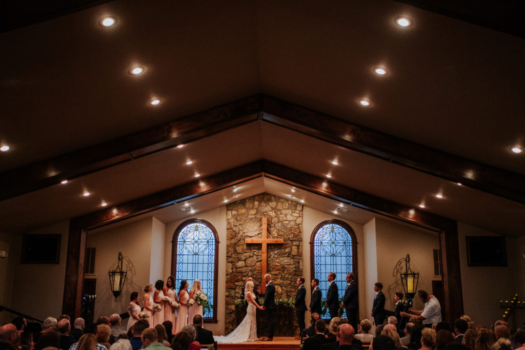 The Stone Chapel At Matt Lane Farms - Fayetteville Arkansas wedding - bride and groom at the alter 