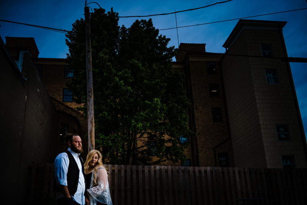 Northwest Arkansas Wedding Photography - Vinson Images - Downtown Rogers Engagement - dramatic couple at sunset