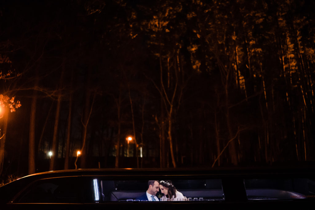 Mildred B Cooper Chapel - Northwest Arkansas Wedding - Vinson Images - bride and groom in limo before leaving for reception