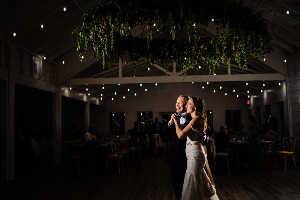 Kindred North Wedding - Northwest Arkansas Wedding - Vinson Images - bride and father dance under chandelier