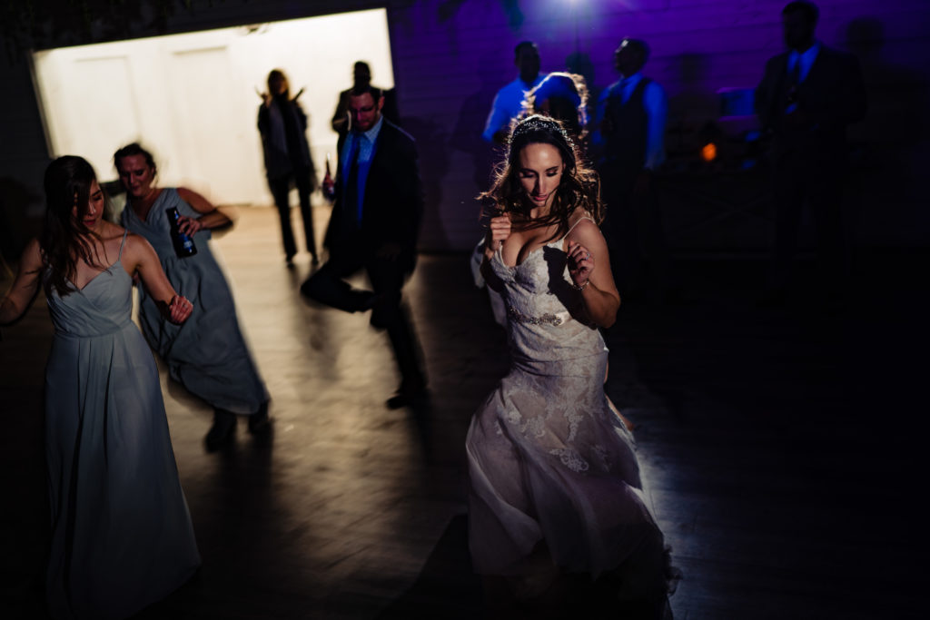 Kindred North Wedding - Northwest Arkansas Wedding - Vinson Images - bride dancing with guests