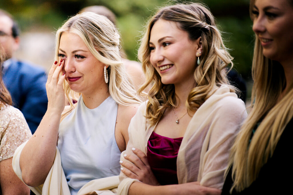 Wedding guest cries during lawn ceremony at Crystal Bridges