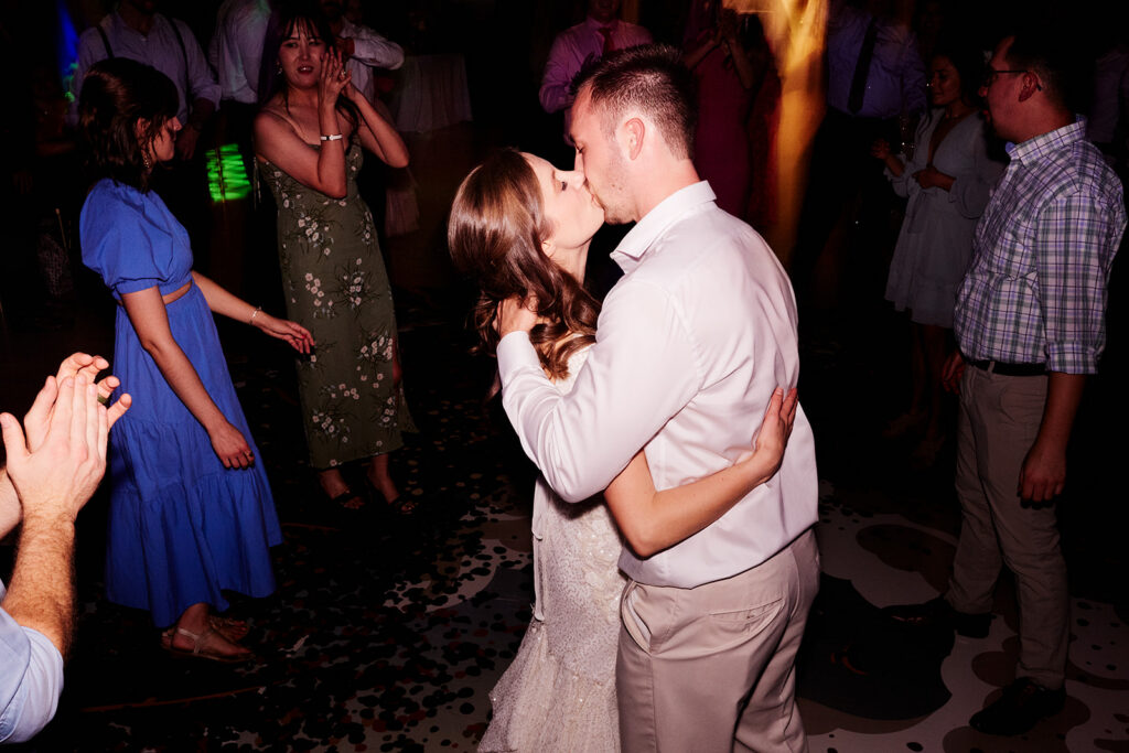 bride and groom party dancing during a Crystal Bridges Wedding Reception 